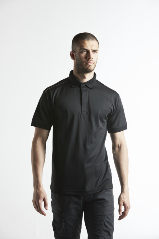 Photo of man wearing Portwest KX3 Polo shirt in black